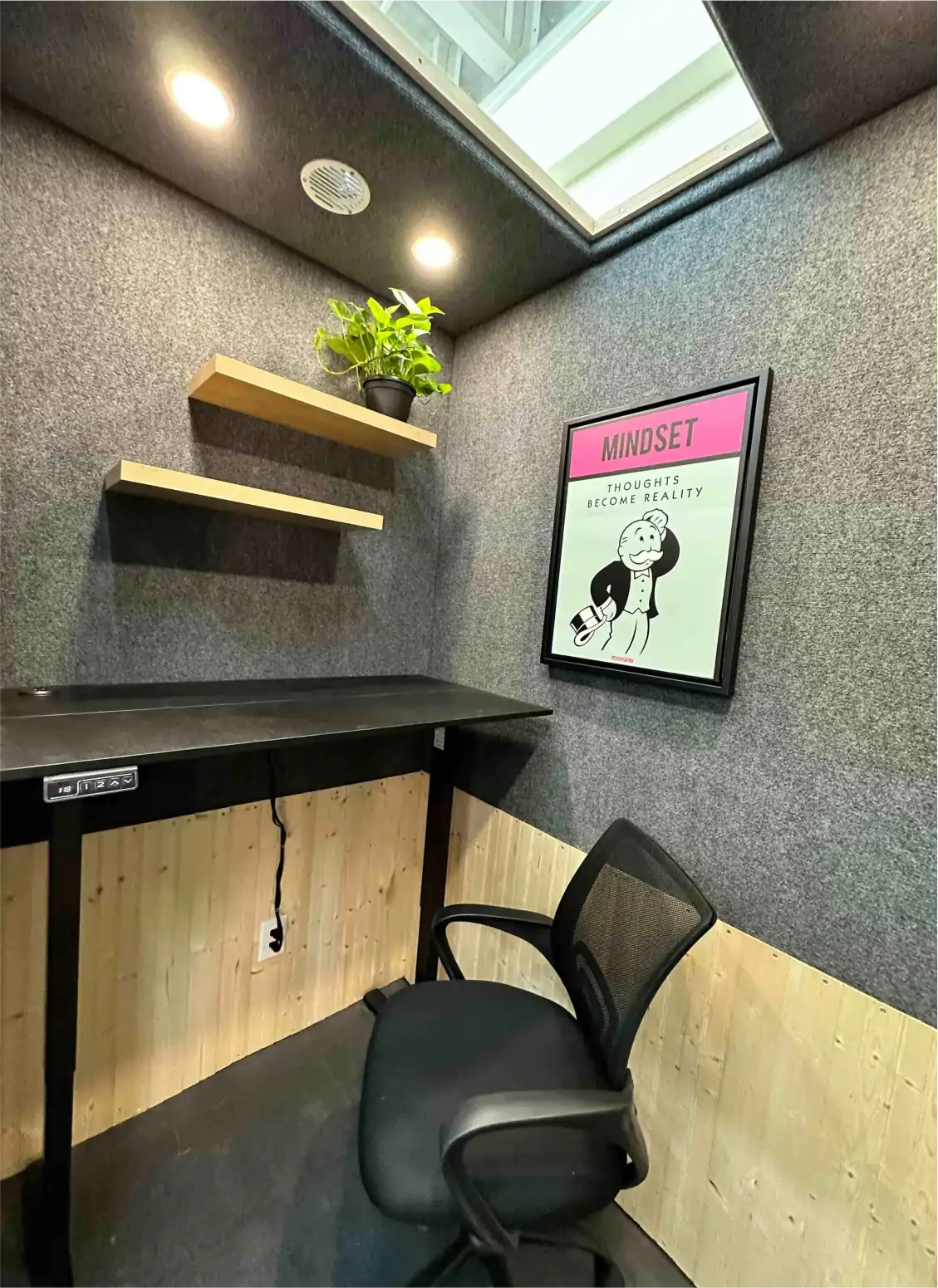 inside the work pod #3, small space, wood accents, standing desk, shelf with plant -
